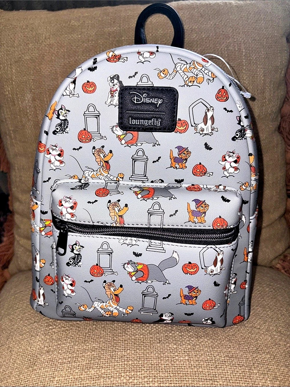 A Disney Halloween pets mini backpack by Loungefly.